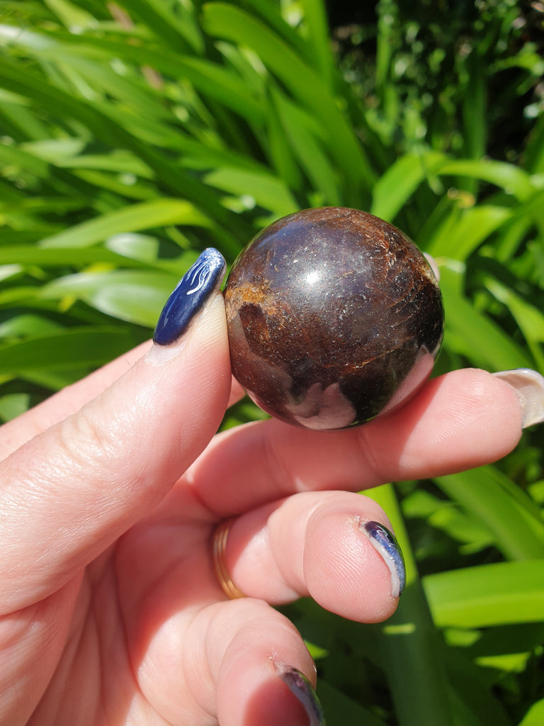 Garnet Star Sphere C – Daughters And Co Crystals